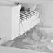 Unfreezing a Jammed Refrigerator Ice Maker